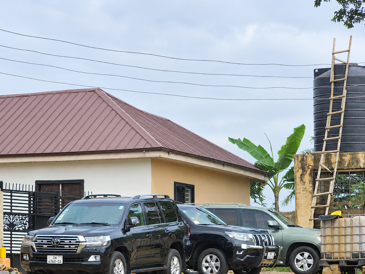 Vehicles in the hotel compound and car-washing area