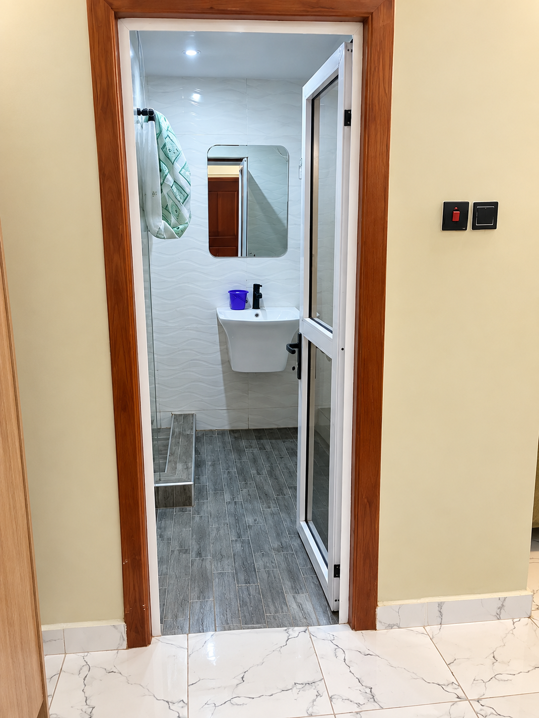 Bathroom seen through an open doorway